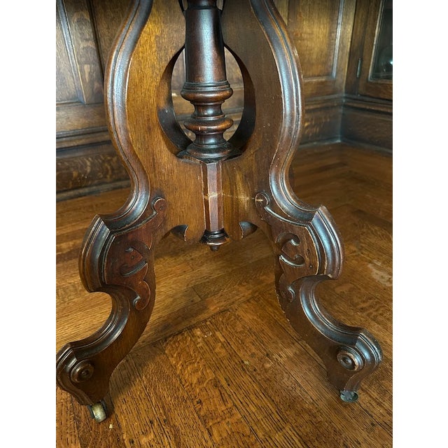 Late 19th Century Victorian Rococo Style Carved Walnut Oval Rolling Parlor/Side/Center Table For Sale In Pittsburgh - Image 6 of 9