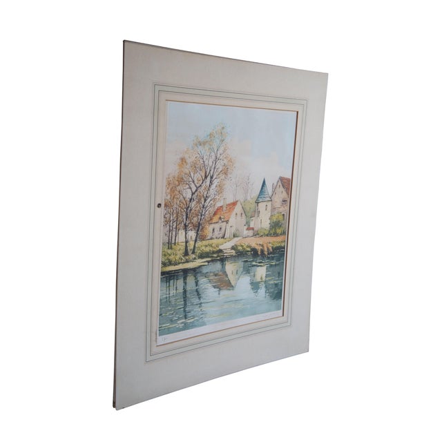 Hand Signed German Etching. Features a European fall landscape showing famrhouse besies a river or lake. Signed in pencil...