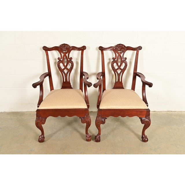 An outstanding pair of Chippendale or Georgian style armchairs or dining captain chairs By Baker Furniture USA, Circa...