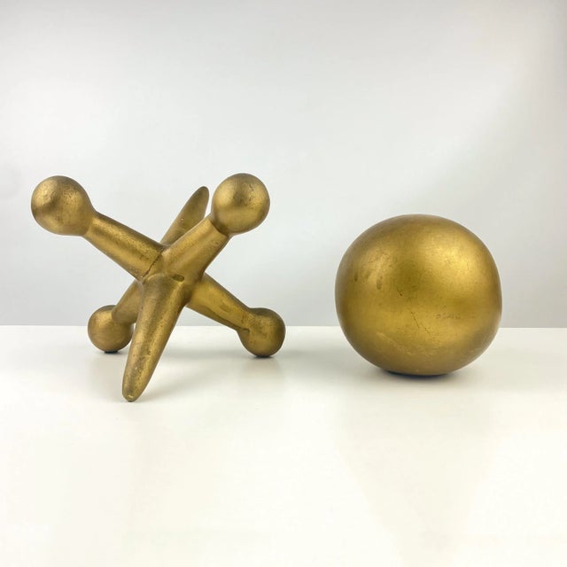 Vintage circa 1970s mid century modern ceramic jack and marble game pieces in gold. Jack had some repairs done as seen in...