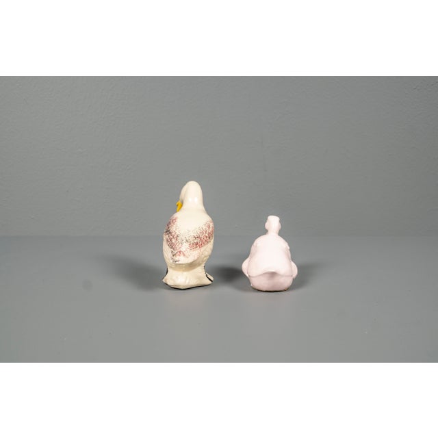 Rare ducks of different sizes, handmade, in pink and a multicolored speckled. The ducks come from the Feita a Mar factory...