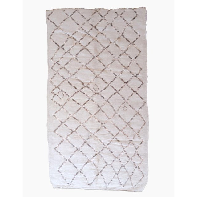 Elevate your living space with this Authentic Beni Ourain Moroccan Rug, handwoven by Atlas Mountains artisans from 100%...