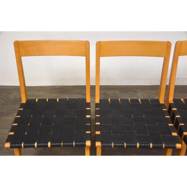 An early set of four mid century modern “666” solid birch dining chairs from the 1940’s designed by Jens Risom for Knoll....