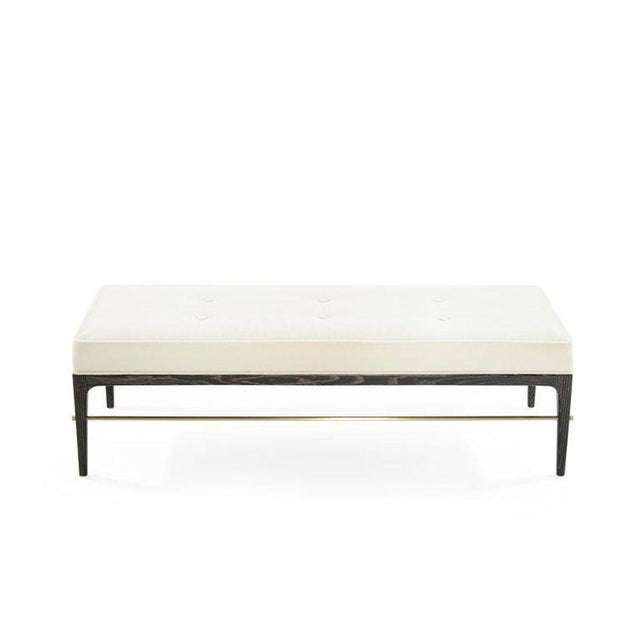 The Linear Bench is a refined take on mid-century modern design inspired by Edward Wormley with a sleek silhouette...