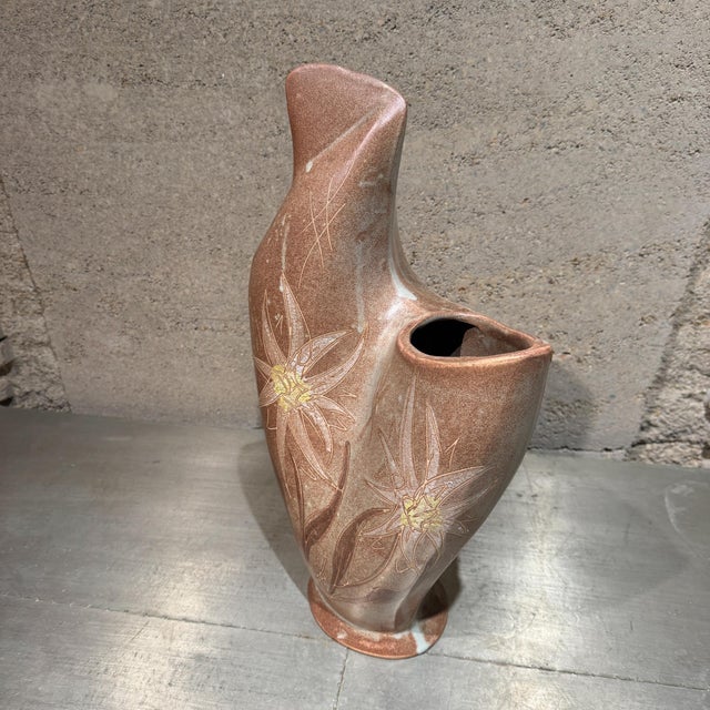 For your consideration, a mid-century biomorphic Vallauris ceramic vase. It features an asymmetrical, organic shape...