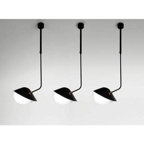 Ceiling lamp model 'curved bibliothèque ceiling lamp' designed by serge mouille in 1953. Manufactured by editions serge...