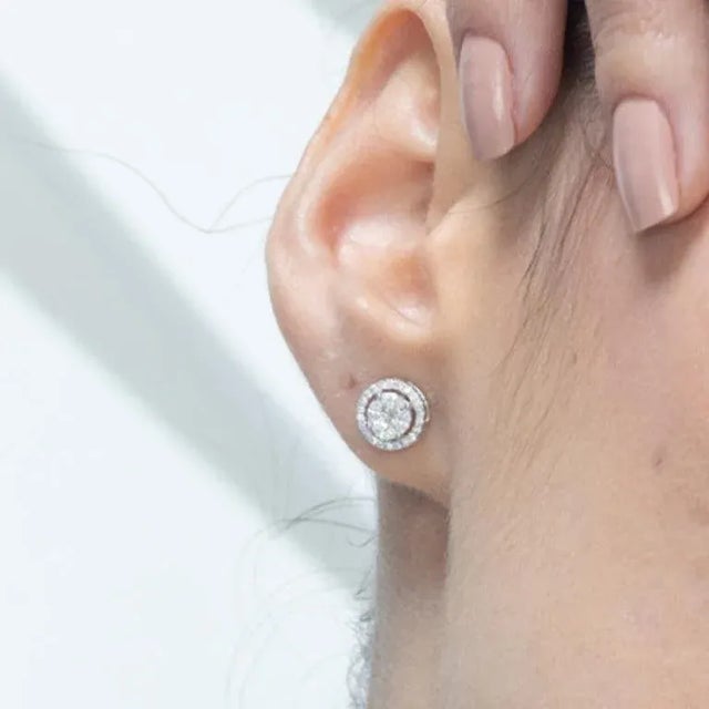 Stunning Natural Diamond Round Studs Earring in 18K Gold to make a statement with your look. You shall need stud earrings...