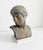 This elegant mid 20th-century decorative bust of Apollo is a refined example of classical revival sculpture. Depicting...