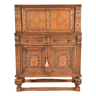 Antique English Jacobean Carved Oak Bar Cabinet, Circa 1920s For Sale