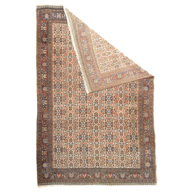 Late 18th Century Persian Qashqai Rug 6'11'' x 10'6''. This well-woven Qashghai tribal piece features an ecru ground...