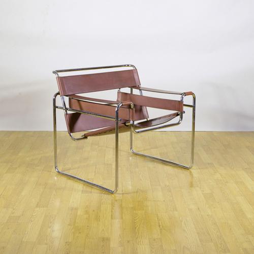 This iconic wassily armchair, also known as the model b3, is a masterpiece of modernist design by marcel breuer and...