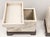 This is a pair of mid-century Asian modern side tables with carved koi fish throughout both body and lid. They are painted...