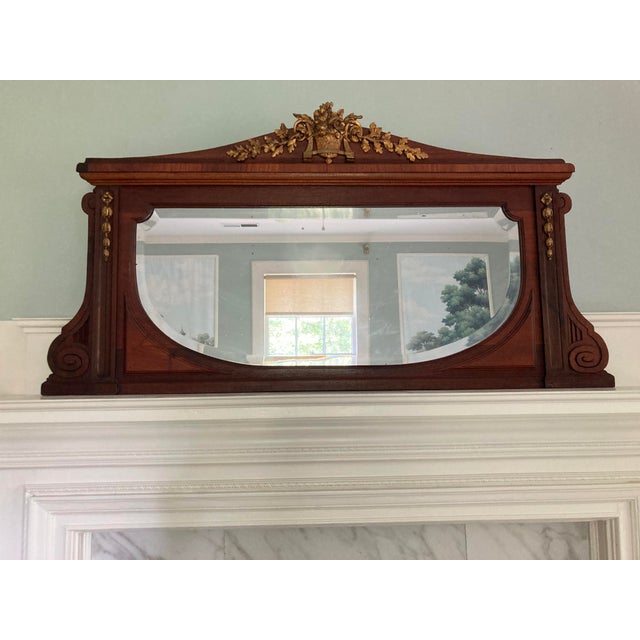 This handsome mirror could enhance a space in many different ways. It would be beautiful over a mantle, or space...