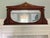 This handsome mirror could enhance a space in many different ways. It would be beautiful over a mantle, or space...