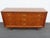 This magnificent Dresser is made of wood, walnut, and veneer. This wonderful Dresser is an excellent example of the Mid-...
