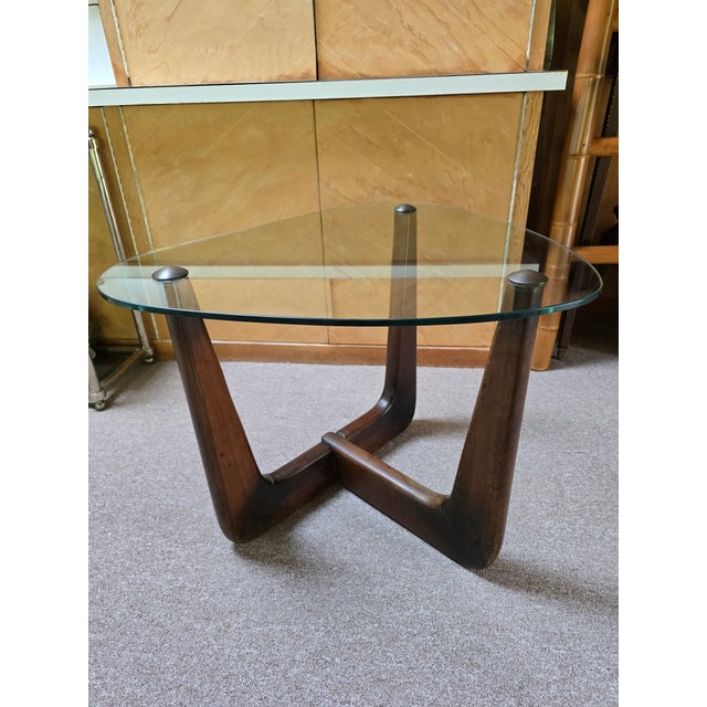 A true mid century modern era designer abstract side table in the style of Adrian Pearsall ( guaranteed vintage from the...