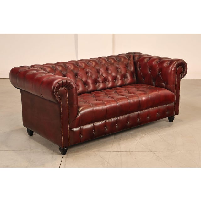 High Quality Tufted Red Leather Sofa or Loveseat with Brass Tack Trim, Mounted on Turned Feet