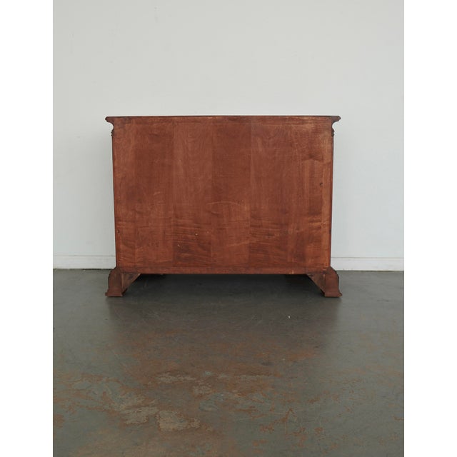 This vintage bombe chest draws from classic Louis XV French design, with a gracefully curved silhouette, serpentine drawer...