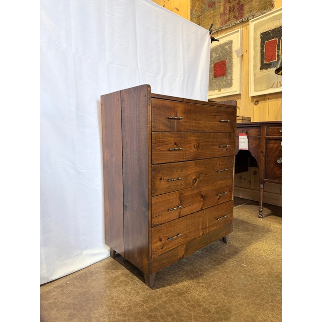 This is a beautifully crafted solid heart pine five drawer chest, showcasing the exceptional warmth and character that...