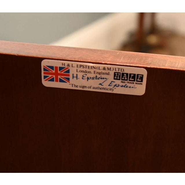 A superb Epstein walnut cabinet, crafted in the traditional French Louis XV style We have included a close up photo of the...