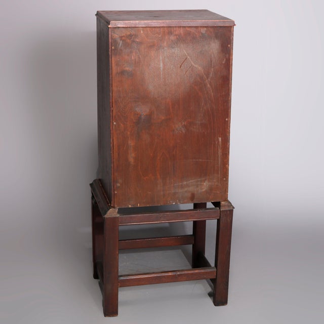 Arts & Crafts Style Carved Oak Cellaret with Figural Cast Phoenix Hardware, Slide Out Drawers and Carved Stand C1910...