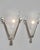 Degué A large pair of 1925-1935 French art deco wall sconces in nickel plated solid brass or bronze holding two beautiful...
