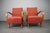 A striking pair of mid-century lounge armchairs attributed to Jindřich Halabala, produced in Czechoslovakia during the...