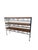 This is the kind of piece that makes a room feel collected rather than decorated. A striking wall-mounted shelf unit,...