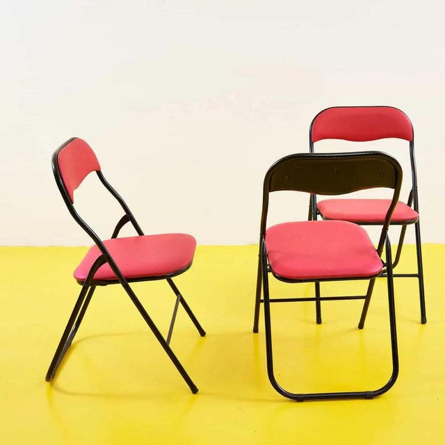 Vintage Red Folding Chairs, 1980s, Set of 3, in Good conditions. Designed 1980 to 1989 This piece is attributed to the...