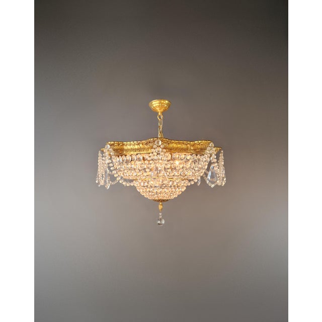 This expressive crystal chandelier has been fully restored in our Berlin workshop with great care and expertise. The...