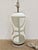 Modern Currey & Co Carved Glass Lamp. Frosted / White geometric design on round acrylic base. Showroom floor sample.