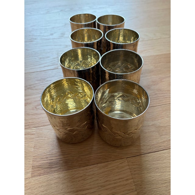 An exceptional set of eight silver-plated tumblers by the prestigious Italian silversmith Calegaro. Founded in 1921,...