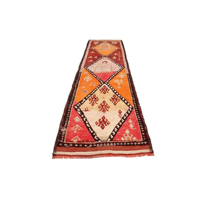Handknotted vintage decorative Herki runner from Northern Iraq. Approximately 50-60 years old. In very good condition.