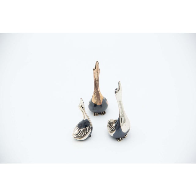 Miniature Silver Swans, Set of 3, in Very Good conditions. Designed from 2000 This piece has an attribution mark, I am...