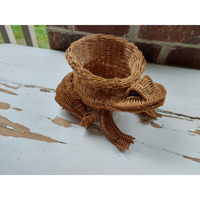 His marble eyes will stare at you like a real frog! He is perfect to organize or as a small plant holder.