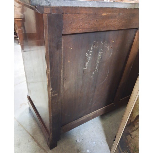 Empire Style Commode with Swan-Neck Handles in Flamed Mahogany and Black Marble, 1920s, in Good conditions. Designed 1920...