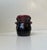Exquisite small ceramic vase executed with over-flowing glazed in maroon, rose, black and dark glazes. It features snails...