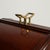 A 20th century English high bar table crafted in wood, featuring a tall and narrow profile supported by a structured base....