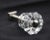 Vintage faceted clear glass drawer or cabinet knob. Screws included. The manufacturer and exact date of creation are...