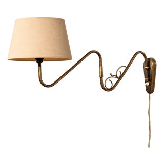 1950s Danish Modern, Articulating Brass, Bakelite Wall Sconce For Sale