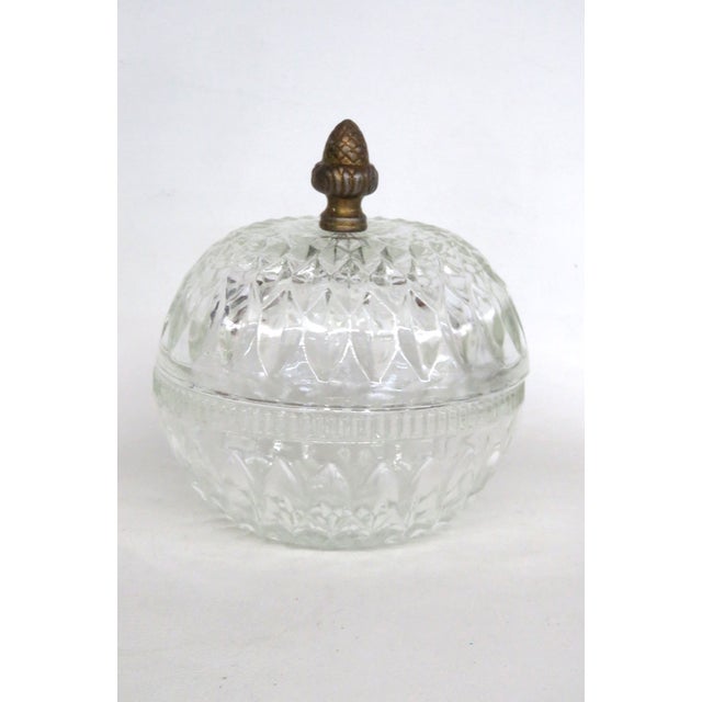 This gorgeous Lidded Bowl / Box is made out of pressed glass. This lovely bowl has excellent vintage style; it presents a...
