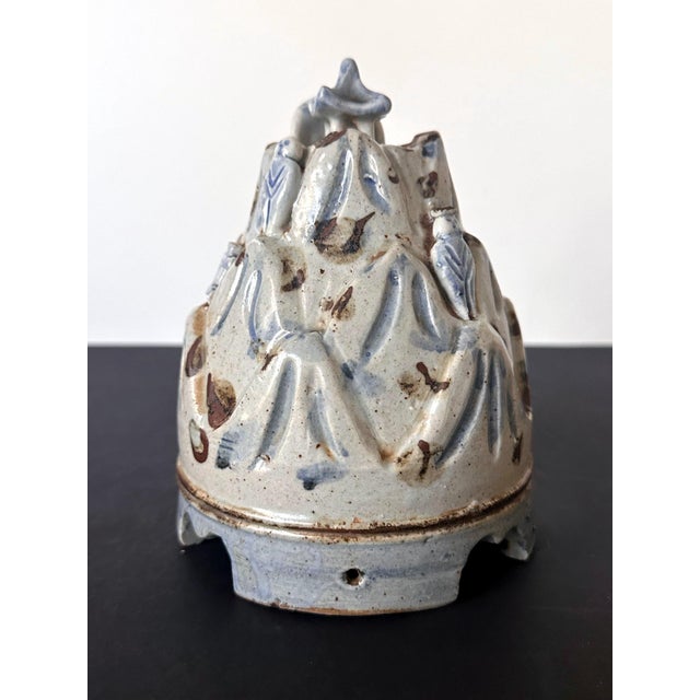 A Korean ceramic mountain form brush rest made as an ornament to rest the pen brush for scholar's desk circa late 19th...
