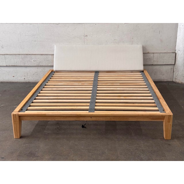 Design Plus Gallery presents a California King Size Classic Bed from Thuma. This contemporary bed showcases a natural wood...