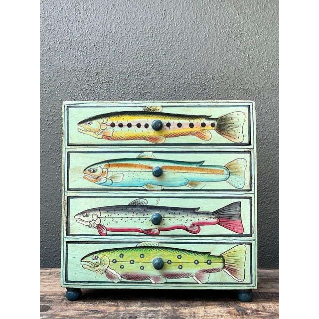 This delightful vintage tabletop chest is a masterwork of rustic folk art, perfectly suited for the sporting enthusiast or...