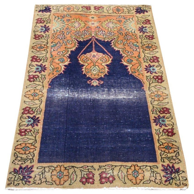 Hand-knotted with care using traditional rug-making techniques, this wool rug blends timeless craftsmanship with a modern...