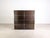 Beautiful brown USM Haller filing cabinet (2x4) for sale. The cabinet features eight compartments, each with a bottom-...