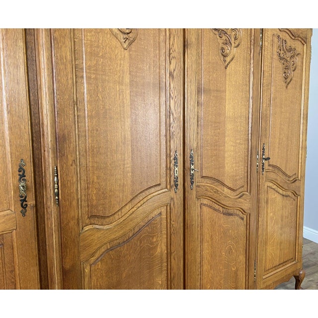 Vintage Louis XVI French Oak Four Door Carved Armoire For Sale - Image 6 of 10