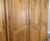 Vintage Louis XVI French Oak Four Door Carved Armoire For Sale - Image 6 of 10