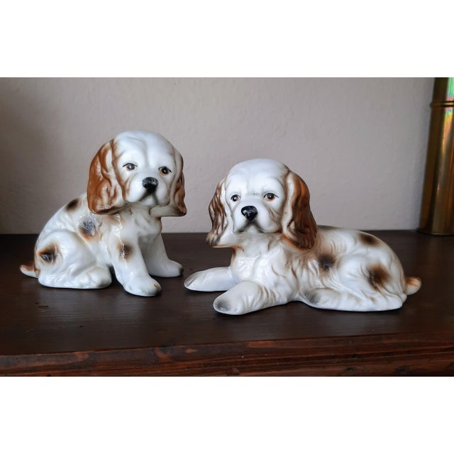 Vintage Ceramic Cocker Spaniel Dog Figurines This charming pair of hand-painted ceramic cocker spaniel figurines dates...
