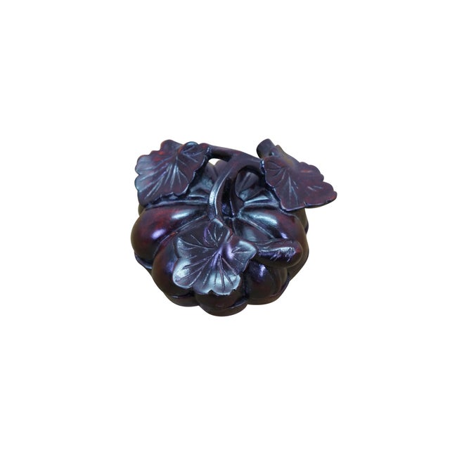 This exquisite Chinese agarwood covered box is masterfully carved into the organic form of a segmented pumpkin, displaying...